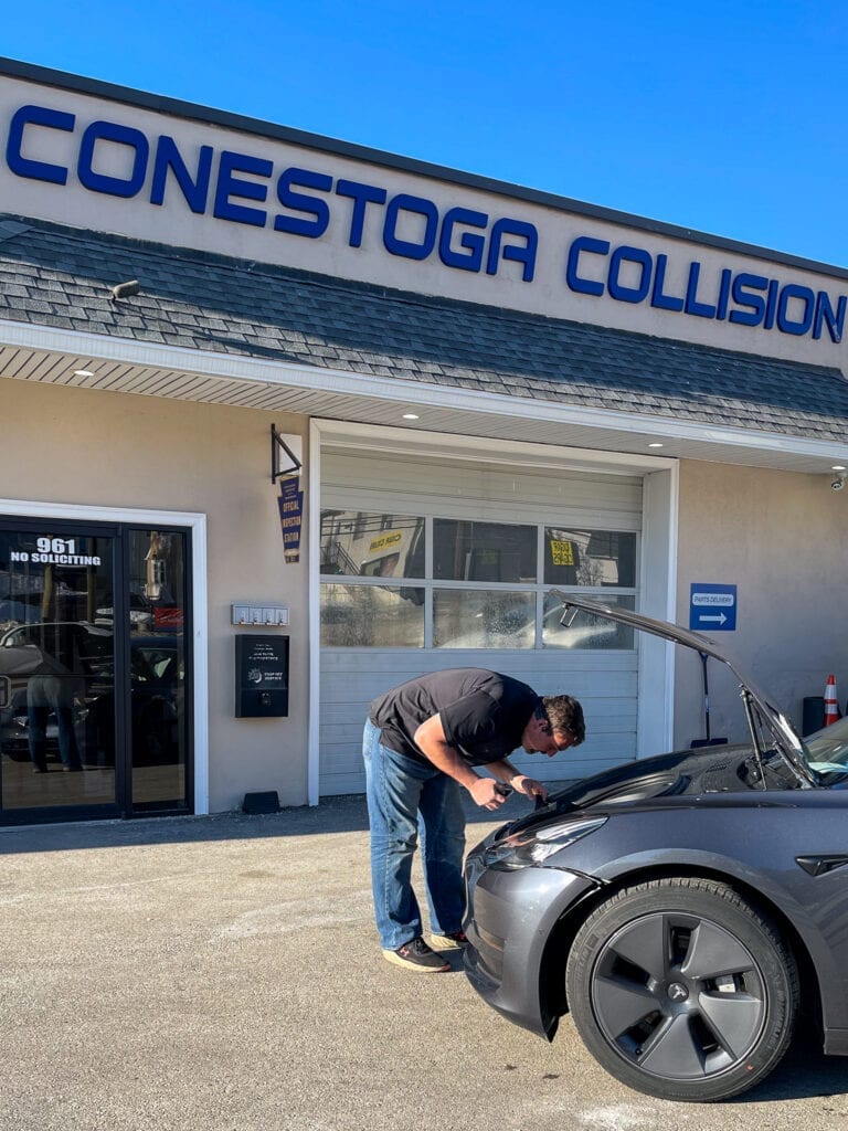 IMG_6369 Conestoga Collision owner Max performing an estimate on a Tesla